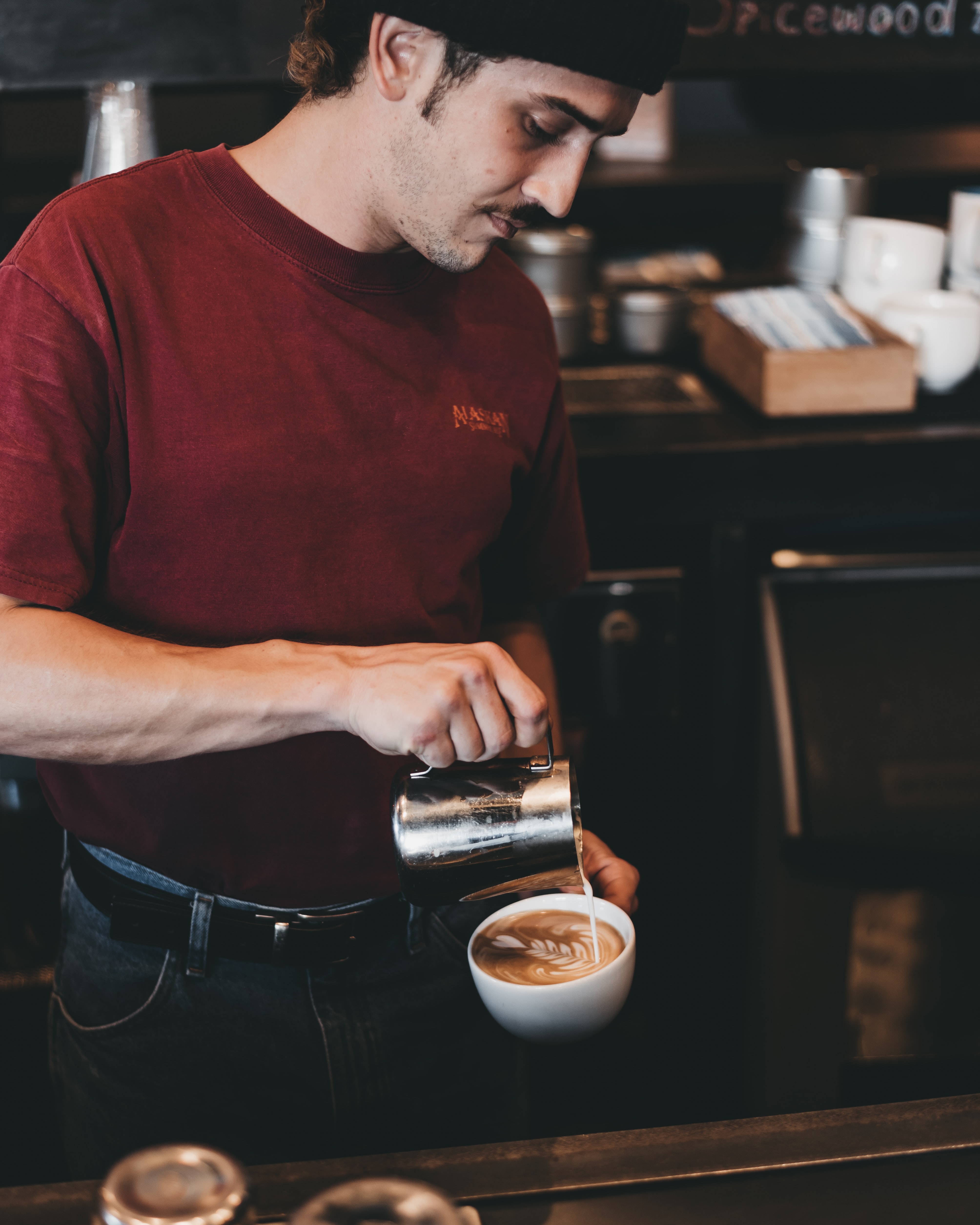 waiter serving hot coffee